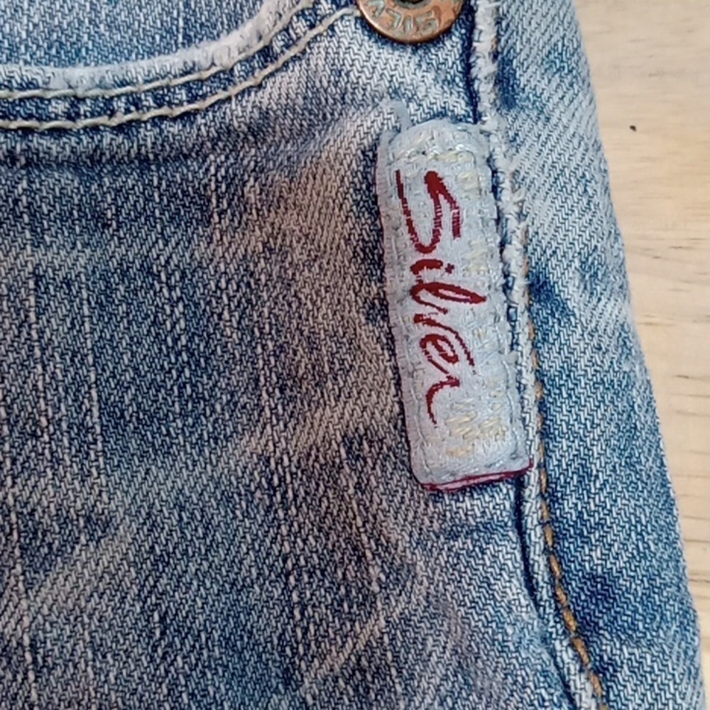 (125) SILVER JEANS FADED & LIGHTLY DISTRESSED WITH TURQUOISE ACCENTS FLARE LEGS - Picture 8 of 8
